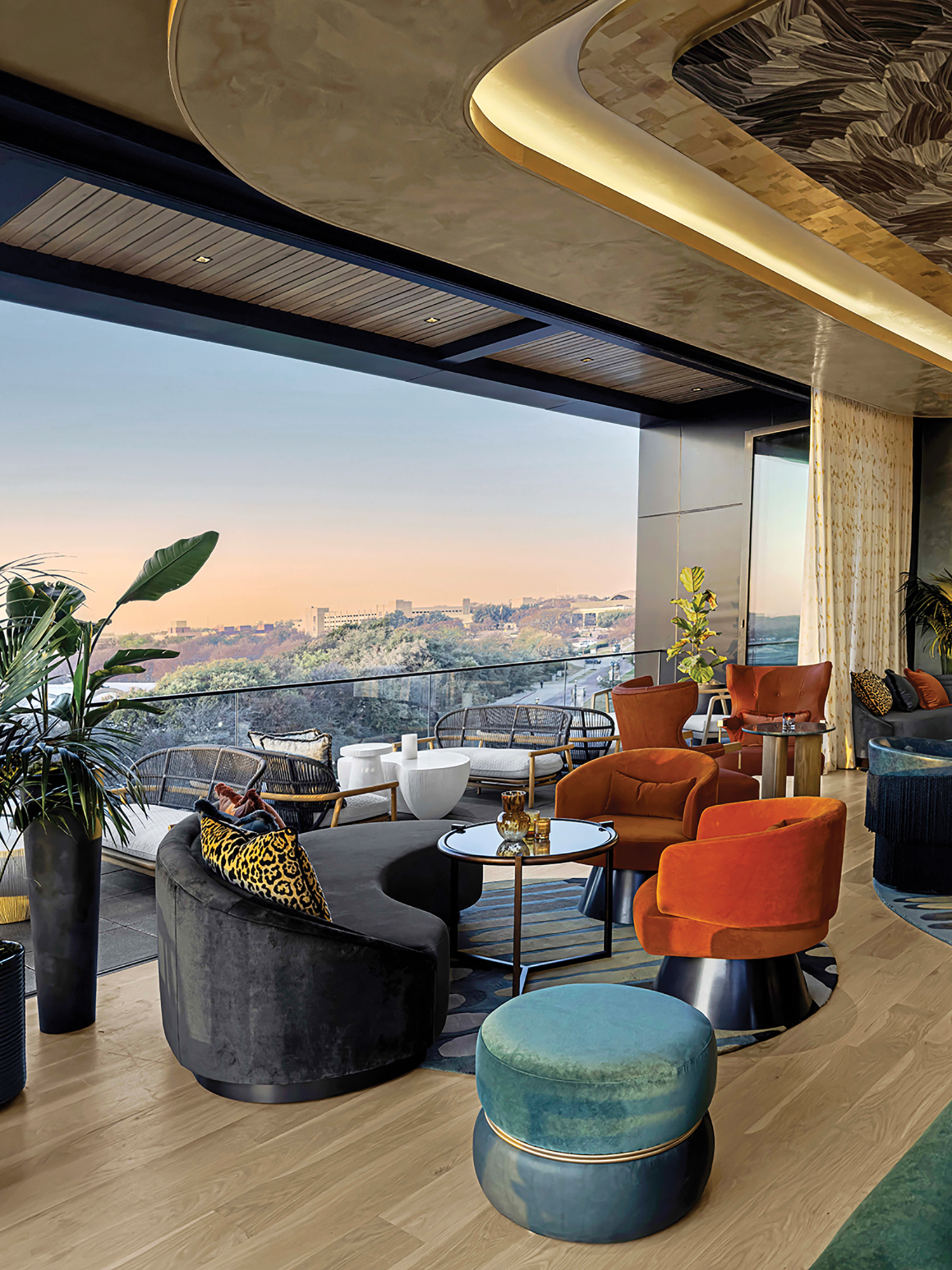 A living room with a view of the city