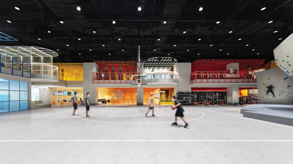 people playing basketball in an expansive gym