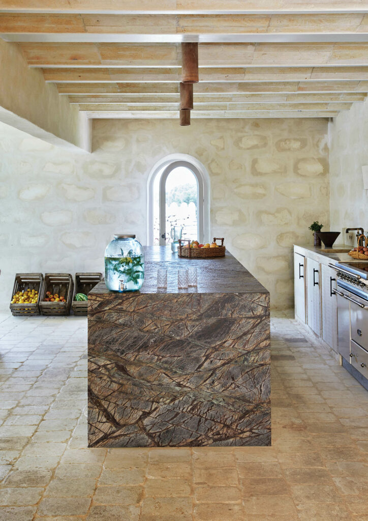 The breakfast kitchen’s island formed from locally sourced marble.