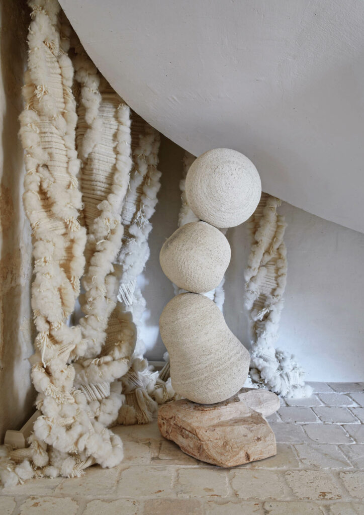 ceramic by Meunié and Roig and a two-story-high, woven-wool piece by Perrine Rousseau.