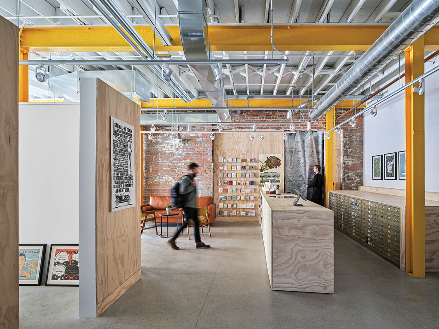 a work area with wood desk 