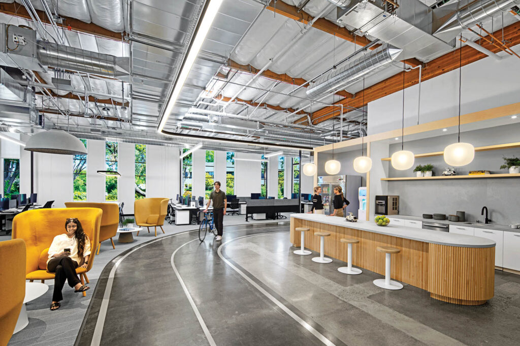 a track on the floor divides the lounge and kitchenette