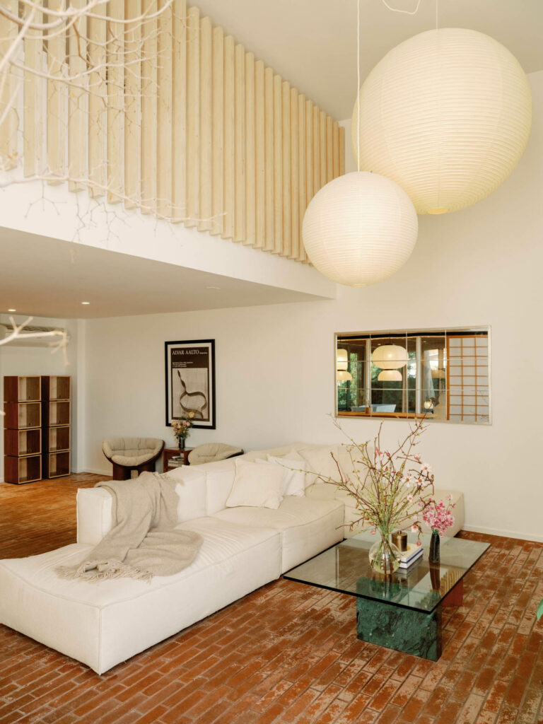 an airy living room with a white couch