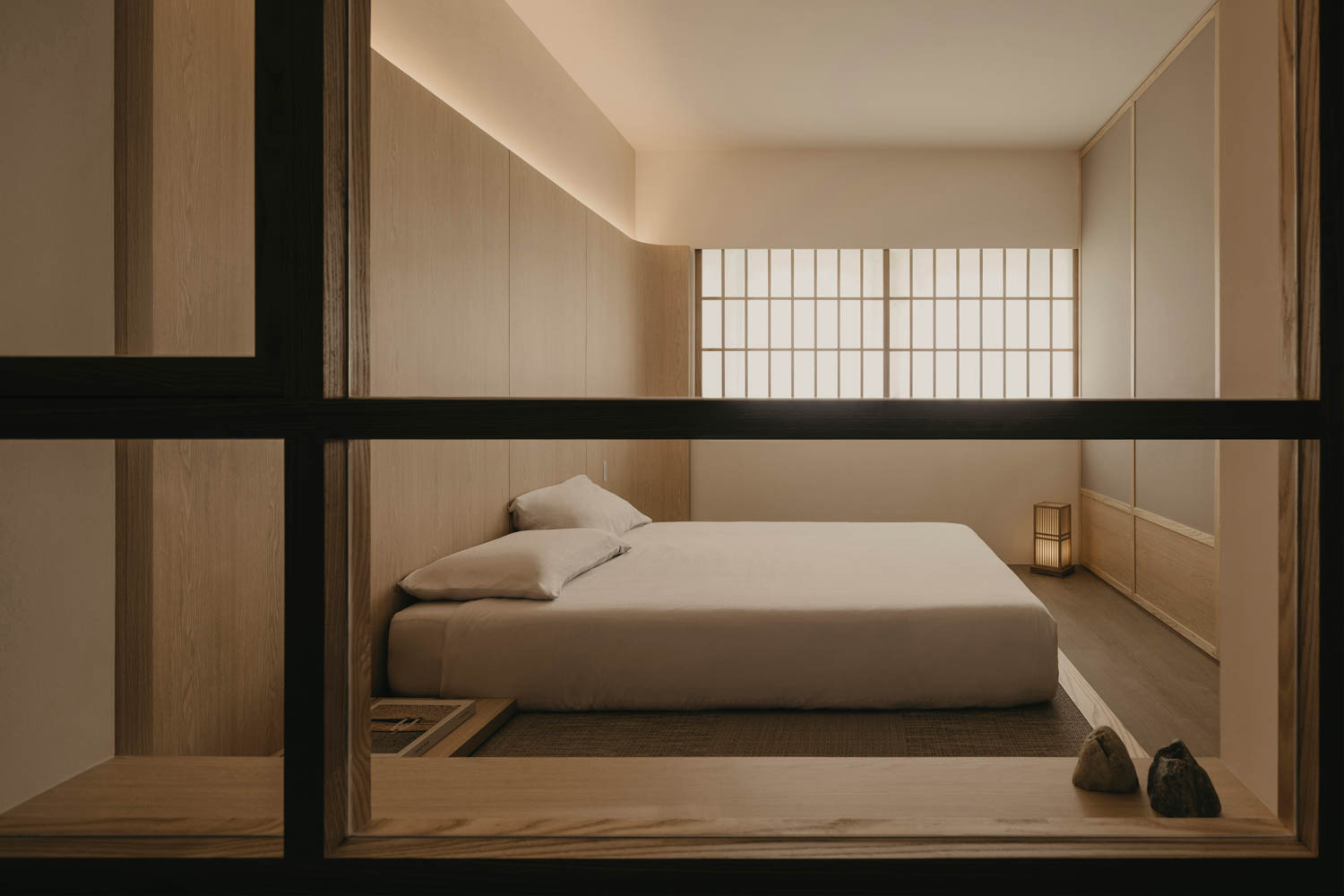 a bed near a window