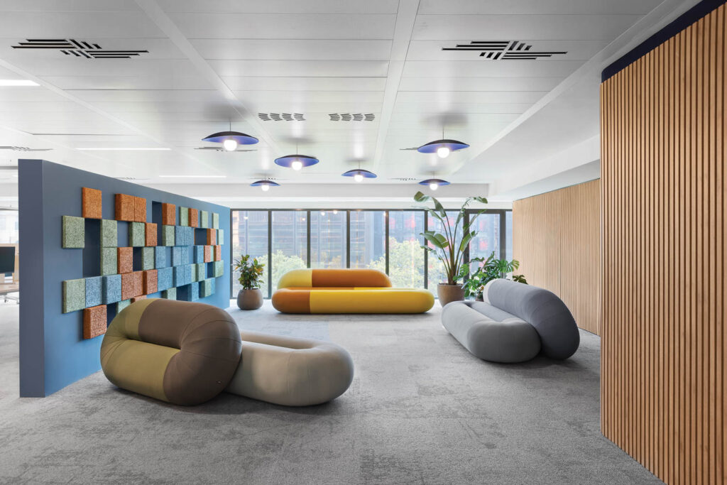 common area with gray flooring and shapely couches