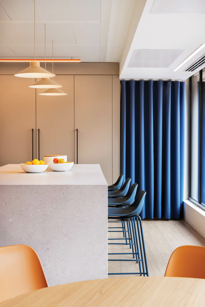 kitchen island with blue bar stools