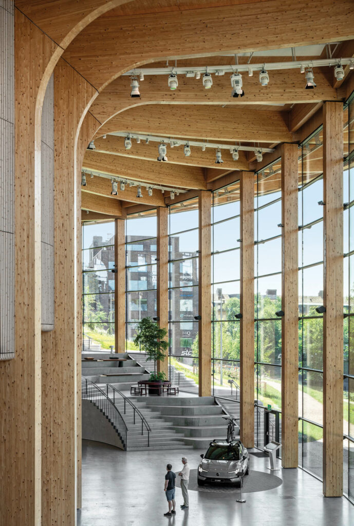 the reception area at world of volvo with a wall of windows