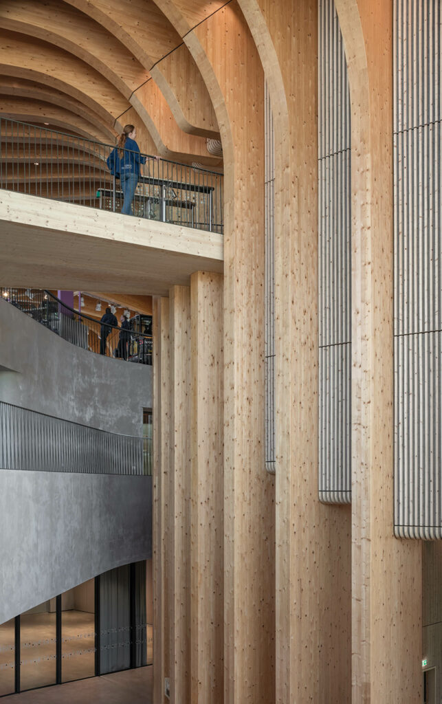 An aerial gangway leads to elevators.