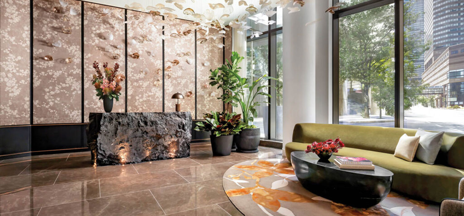 lobby with gold leaf installation hanging from above