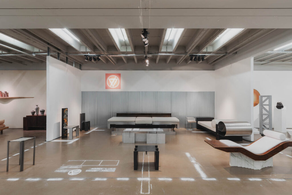 showroom with grey themed walls, couches and furnishings