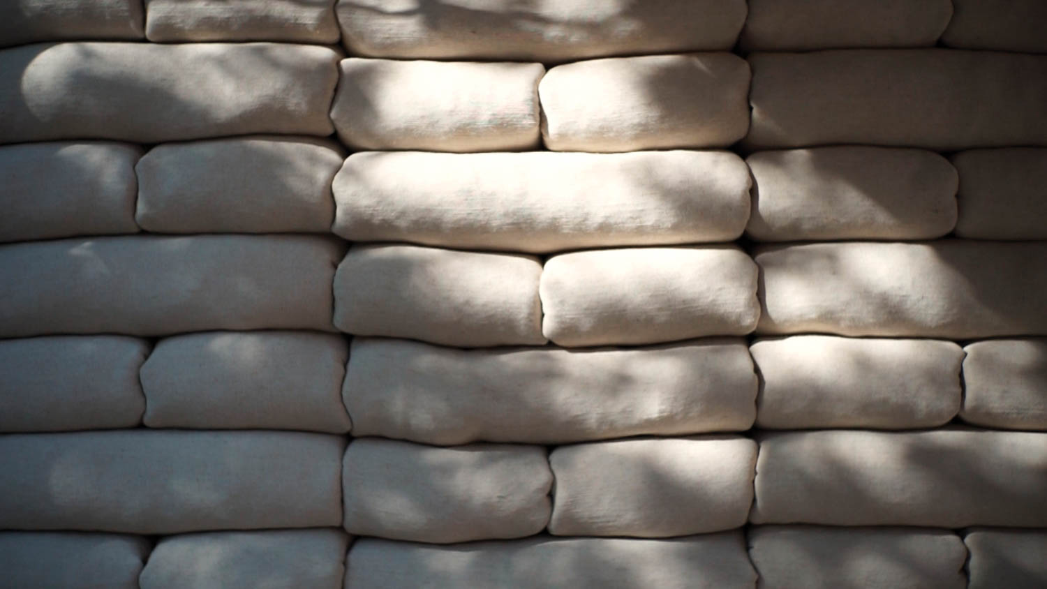 stacks of white bricks that serve as a wall for this bakery