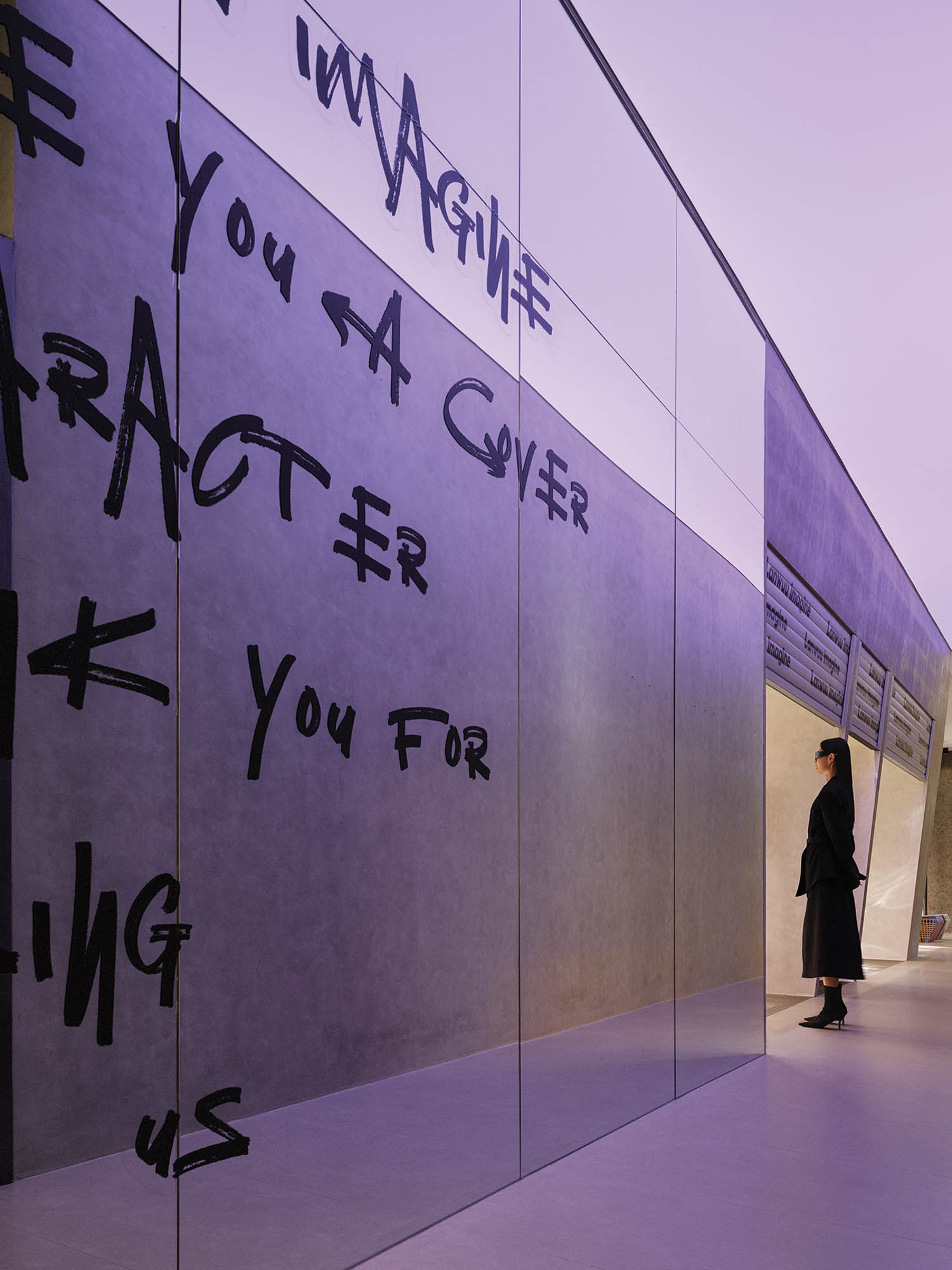 purple stainless-steel walls with words written on them