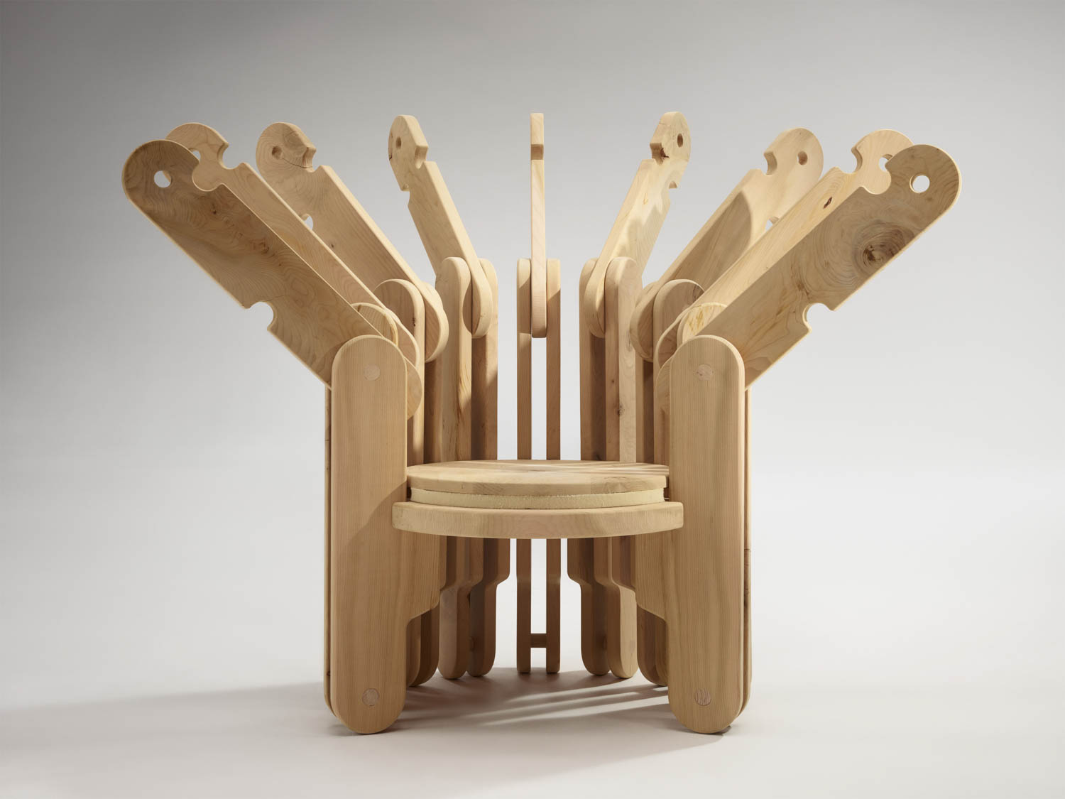 wooden chair that stretches out with multiple arms