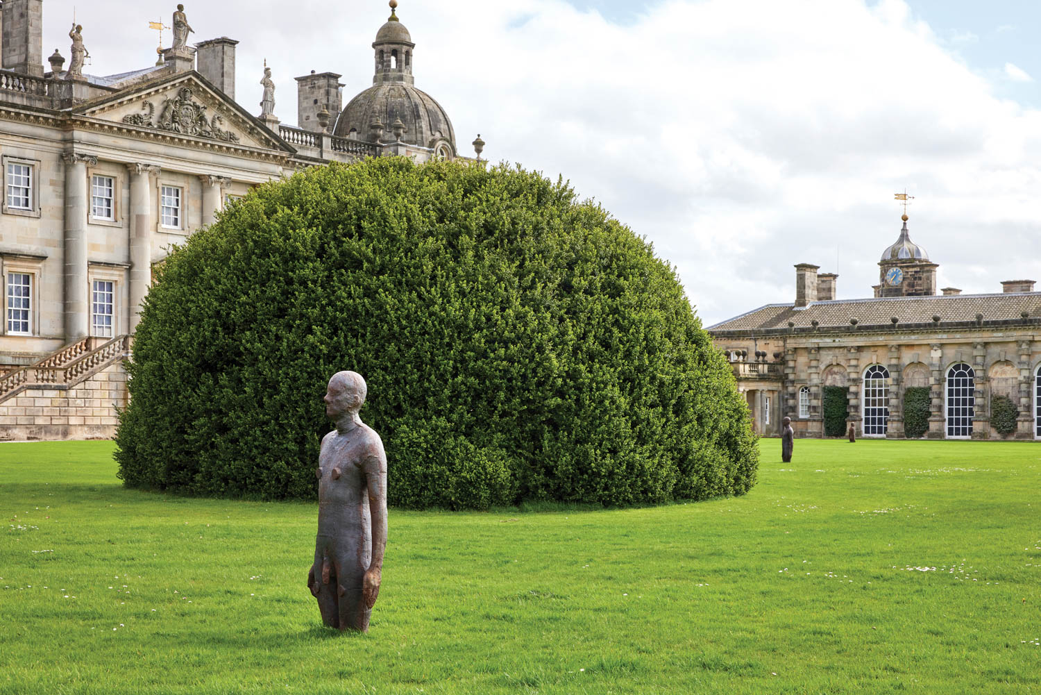 cast-iron human figure amidst the Houghton Hall grounds