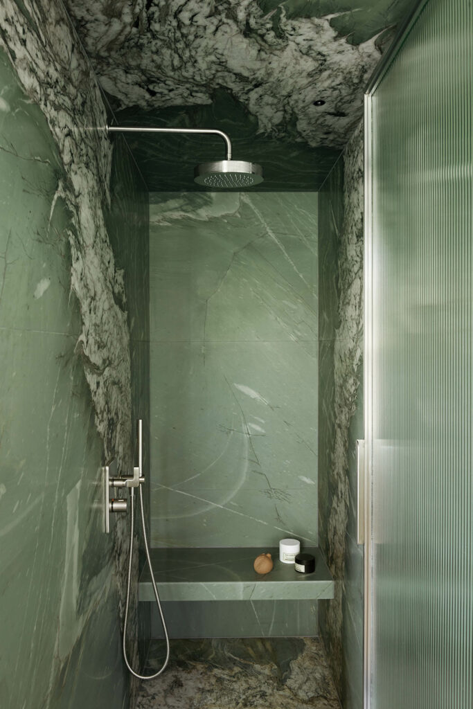 green marble wall shower