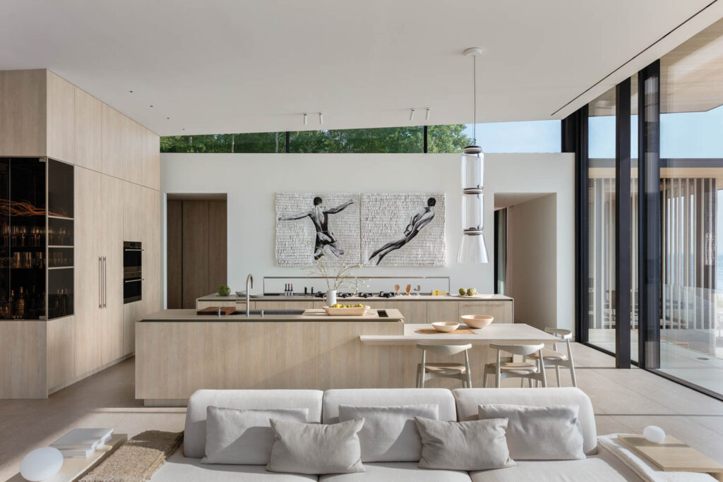 view of kitchen with artwork and pendant hanging over kitchen island