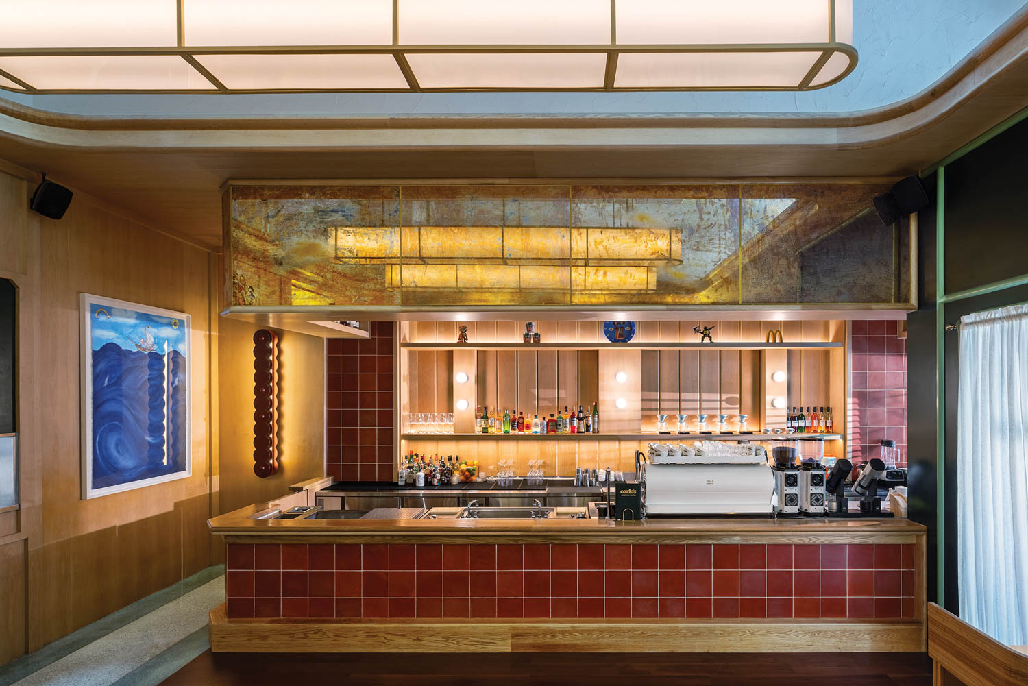 front of dining area with red tile counter and glass ceiling