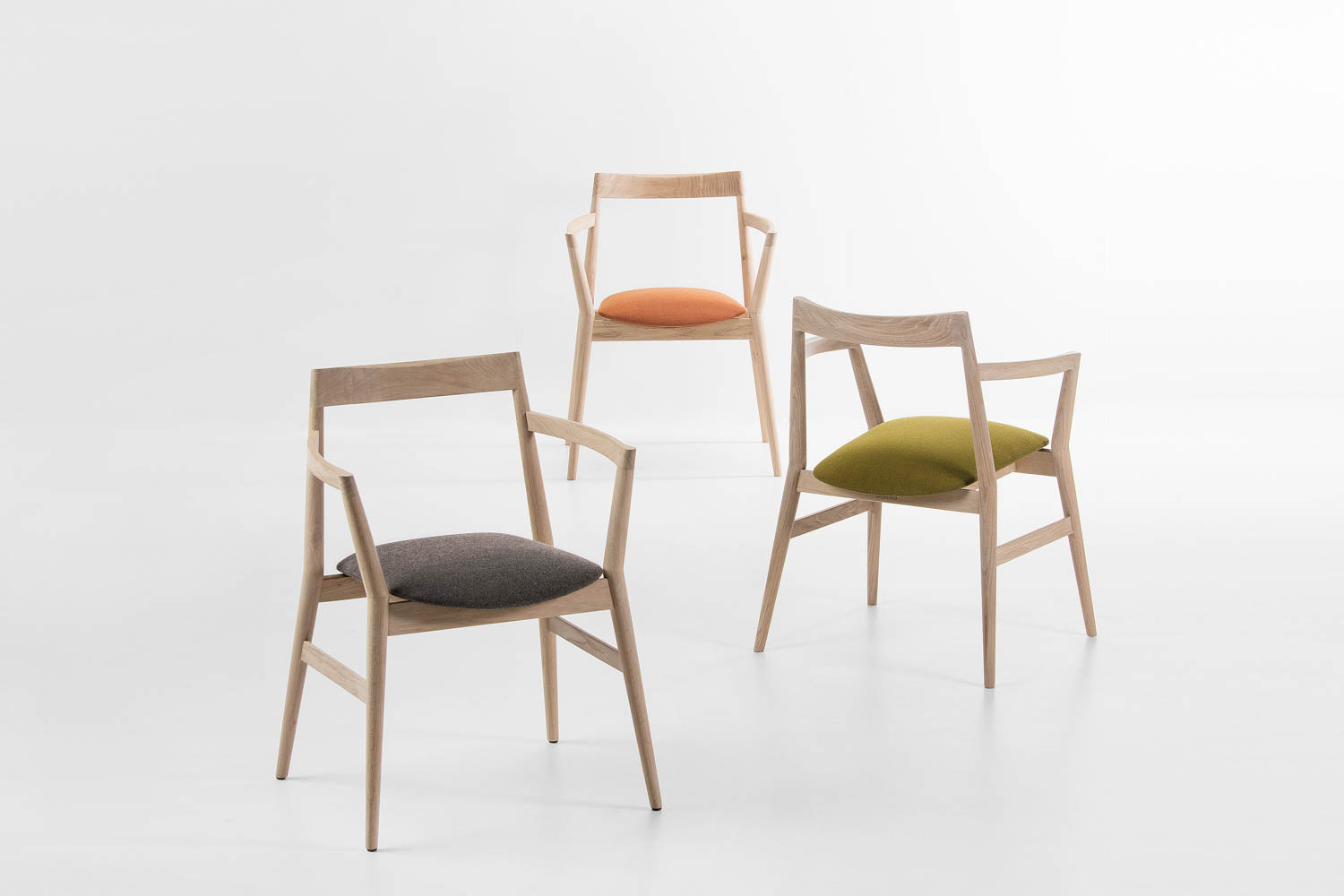 series of three chairs with no back