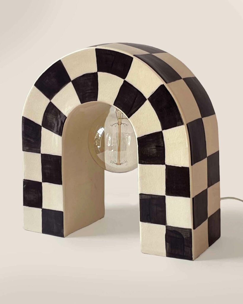 arched lamp with a black and white checked pattern