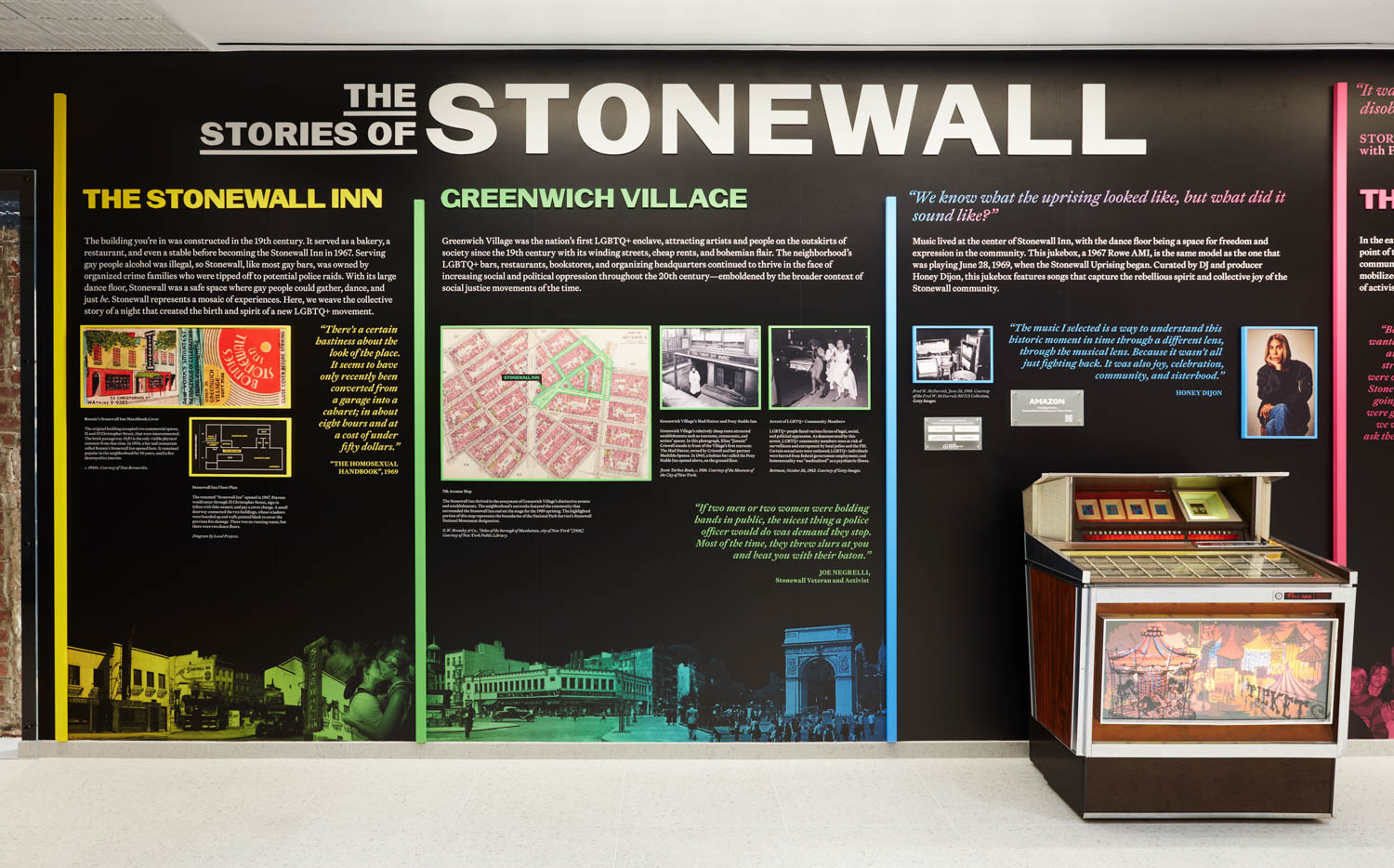 dark vinyl signage talking about the history of Stonewall with bright pictures